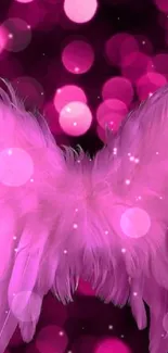 Pink angel wings with bokeh background on mobile wallpaper.