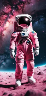 Pink-suited astronaut on a colorful alien planet under a starry sky.