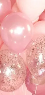 Charming pink balloons with glitter decoration.