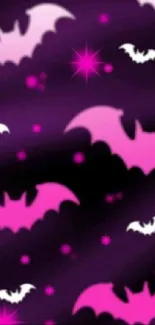 Purple background with pink bats and stars, perfect for Halloween.