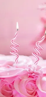 Pink cake with swirling candles for a birthday celebration wallpaper.