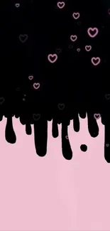 Dripping black on pink background with hearts.