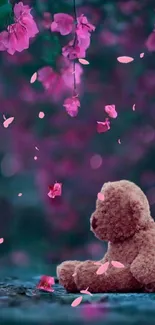 Teddy bear with pink blossoms background.