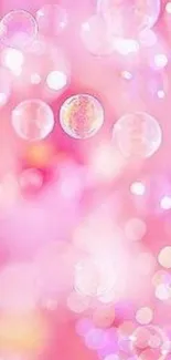 Vibrant pink bubble abstract wallpaper with soft bokeh.