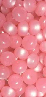 Pink bubble beads create a calming and stylish wallpaper.