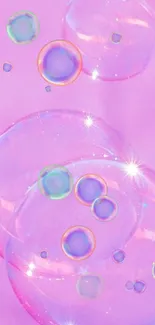 Pink bubbles on a soft pink background creating a dreamy mobile wallpaper.