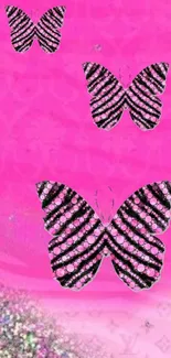 Pink wallpaper with glittery black butterflies and zebra stripe accent.