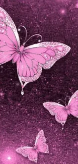 Pink butterflies on glittery background wallpaper.