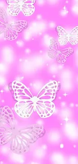 Pink wallpaper with white butterflies design.