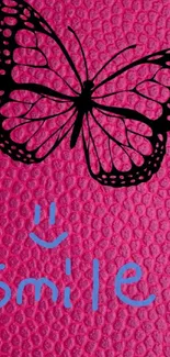 Pink wallpaper with a butterfly and 'smile' text.