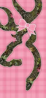 Pink camo deer wallpaper with bow on checkered background.