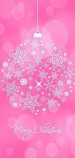 Pink Christmas ornament wallpaper with snowflakes and holiday theme.