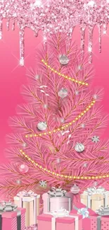 Pink Christmas tree with gifts and decorations in glittery background.