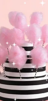 Pink cotton candy pops with black and white stripes.