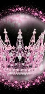 Pink crown with glitter effect on a black background.