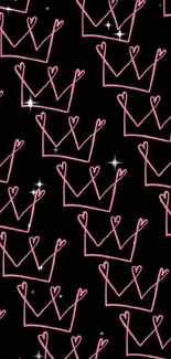 Mobile wallpaper with pink crowns on black background.