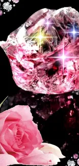 Pink crystal and rose on a black background with sparkling flowers.