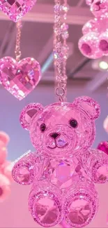 Sparkling pink crystal teddy bear with hearts on mobile wallpaper.