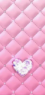 Mobile wallpaper featuring a quilted pink background with a diamond heart.