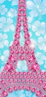 Pink Eiffel Tower with gems on blue floral background wallpaper.