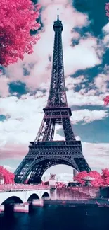 Eiffel Tower with vibrant pink sky and trees in a stylish mobile wallpaper.