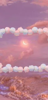 Dreamy pink sunset mobile wallpaper with seashell frame.