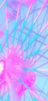 Vibrant pink Ferris wheel with pastel background.