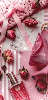 Pink floral wallpaper with roses, perfume, and sleep mask.