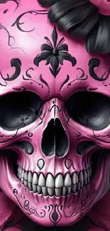 Pink skull with intricate floral art design.