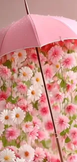 Pink umbrella with cascading pink and white flowers