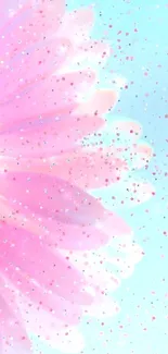 Bright pink flower with glitter on a blue background.