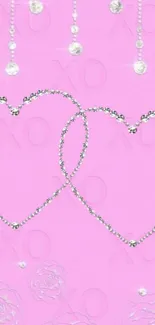 Pink wallpaper with gem hearts and XO pattern.