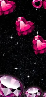 Mobile wallpaper with pink gemstone hearts on a starry background.