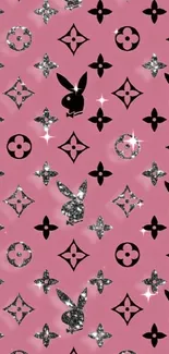 Pink wallpaper with black and silver pattern.