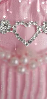 Sparkling pink wallpaper with glitter heart and pearls.