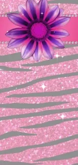 Vibrant pink glitter phone wallpaper with central purple flower.