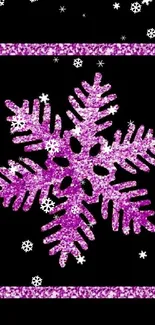 Pink glitter snowflake on black wallpaper