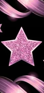 Pink glitter star design on black background.