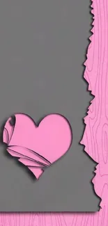 Pink heart cutout on wood texture background.