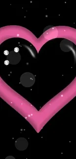 Pink heart on black background minimalist art wallpaper.