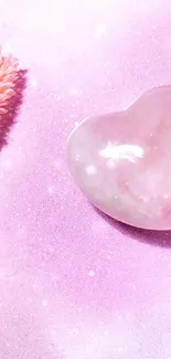 Pink heart crystal on soft pink background wallpaper.