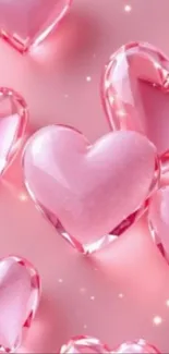 Pink crystal heart wallpaper with shimmering effects.
