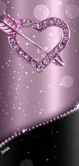 Pink heart diamond wallpaper with arrow and sparkling design.