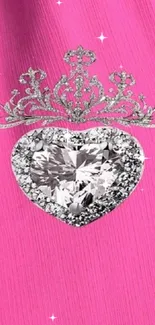 Heart-shaped diamond on pink background with crown.