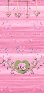 Pink heart and floral wallpaper with romantic design.