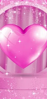 Pink heart with glitter on a mobile wallpaper.