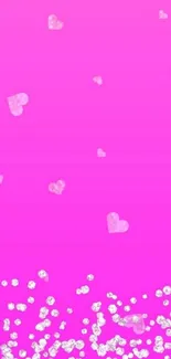 Pink wallpaper with hearts and glitter effect.