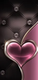 Luxurious pink heart on black quilted leather background.