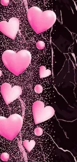 Vibrant pink hearts on a marble background.