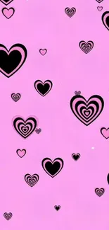 Vibrant pink mobile wallpaper with diverse heart patterns.